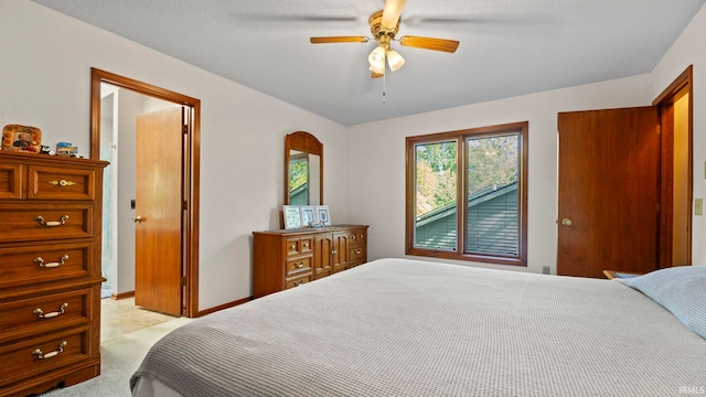bedroom featuring baseboards and a ceiling fan