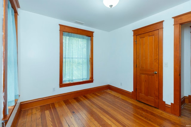 empty room featuring hardwood / wood-style floors