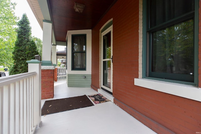 doorway to property with a porch