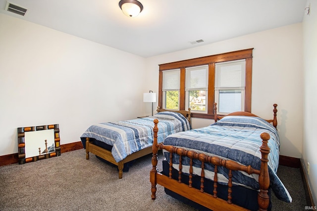 bedroom featuring carpet