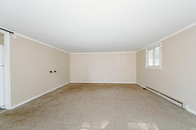 carpeted empty room featuring ornamental molding and a baseboard heating unit