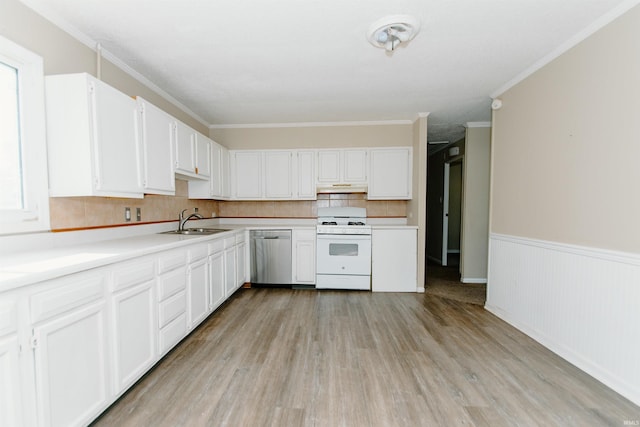 kitchen with ornamental molding, sink, dishwasher, white stove, and white cabinetry