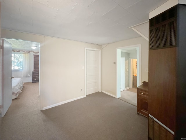 empty room featuring carpet floors