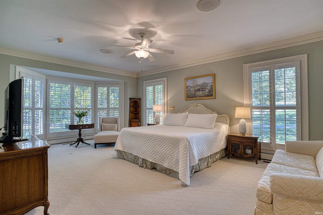 carpeted bedroom featuring ceiling fan and multiple windows