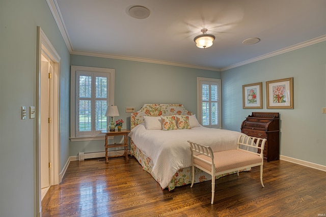 bedroom with dark wood-type flooring, crown molding, and a baseboard heating unit