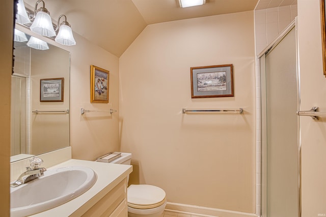 bathroom featuring vanity, a shower with door, tile patterned flooring, vaulted ceiling, and toilet