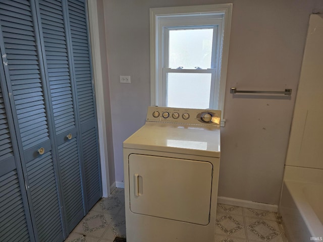 laundry area featuring washer / dryer