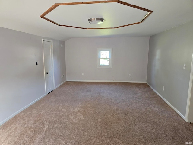 spare room with light colored carpet