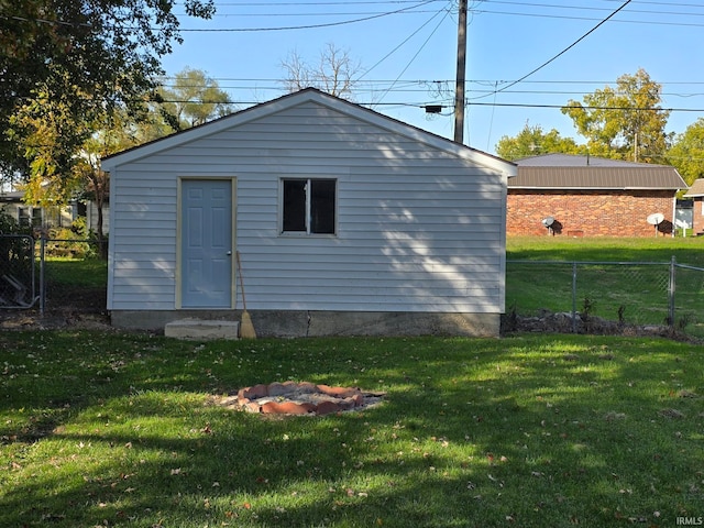 view of outdoor structure with a yard