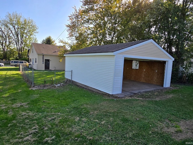 view of outdoor structure with a lawn