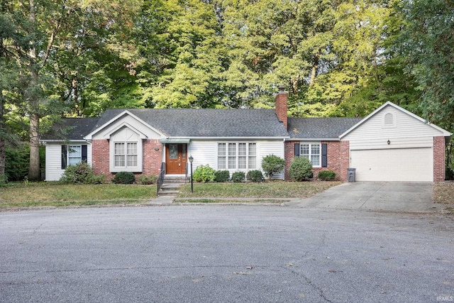 single story home featuring a garage