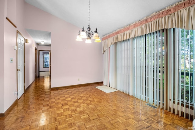 unfurnished dining area featuring light parquet flooring, vaulted ceiling, an inviting chandelier, and a textured ceiling