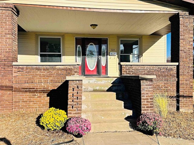 entrance to property with covered porch