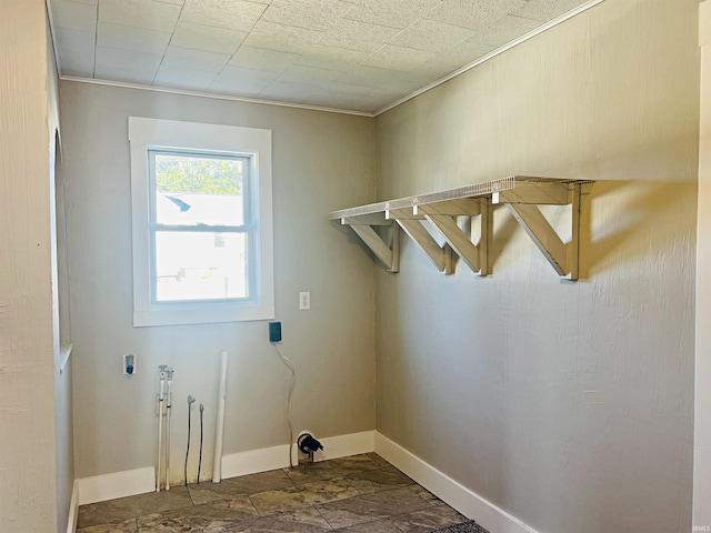 laundry room with crown molding