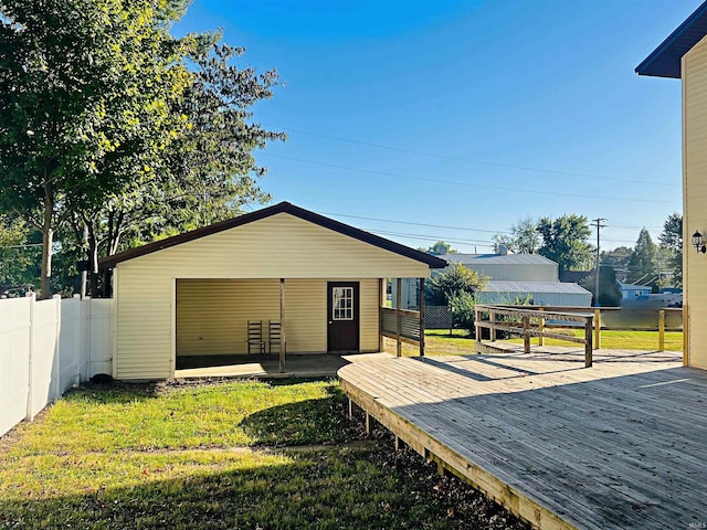 view of outbuilding featuring a lawn