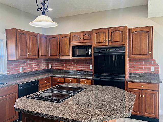 kitchen featuring a kitchen island, a textured ceiling, decorative light fixtures, backsplash, and black appliances