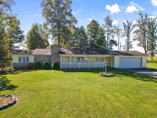 ranch-style house with a garage, a front yard, and covered porch