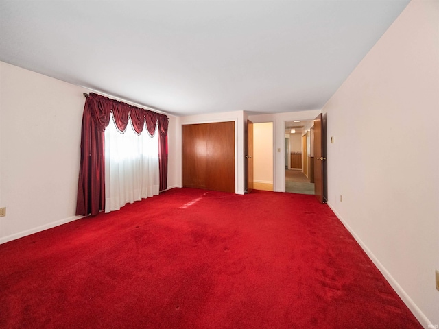 spare room featuring carpet