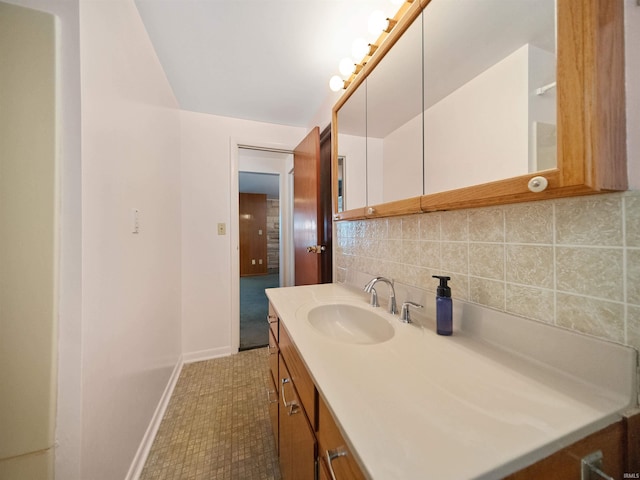 bathroom with backsplash and vanity