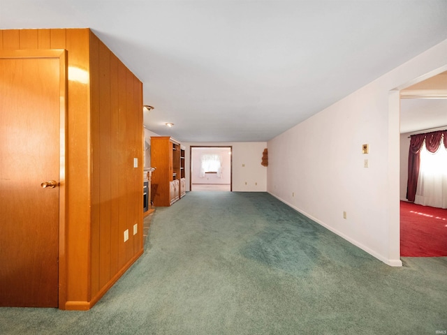 unfurnished room with carpet flooring