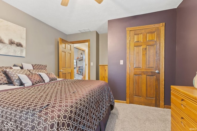 carpeted bedroom featuring ceiling fan