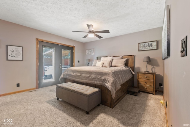 carpeted bedroom with a textured ceiling, ceiling fan, and access to outside