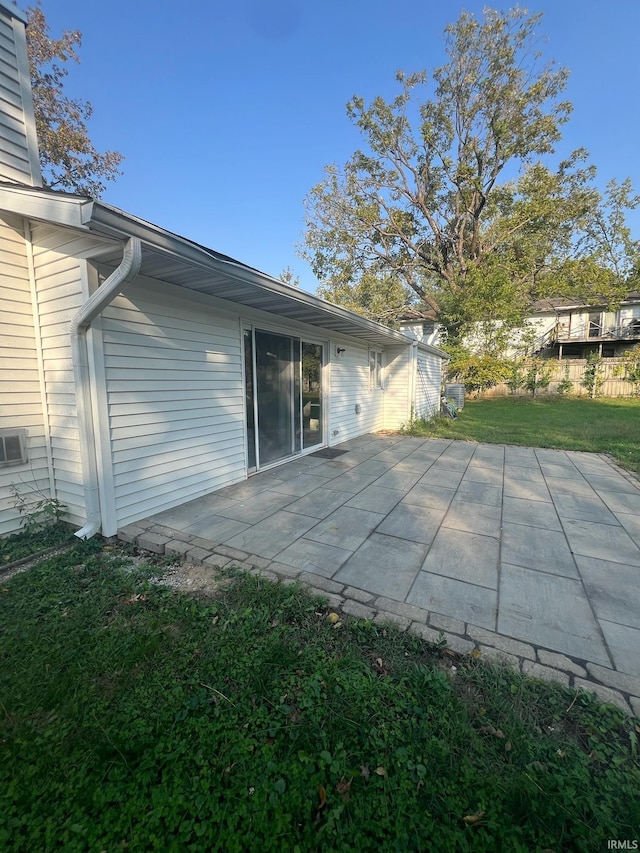 back of house featuring a patio