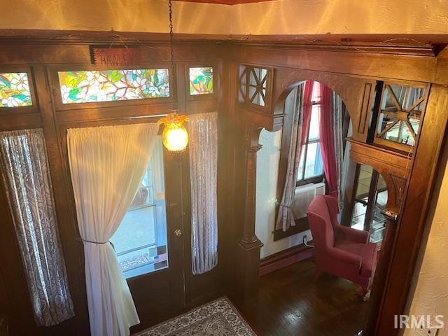 doorway to outside featuring hardwood / wood-style floors and a wealth of natural light