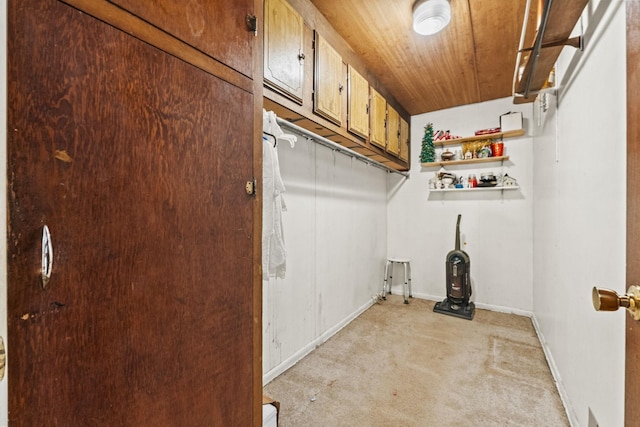 6885 N 315 E, Howe, IN 46746 - washroom featuring light colored carpet, baseboards, and wood ceiling
