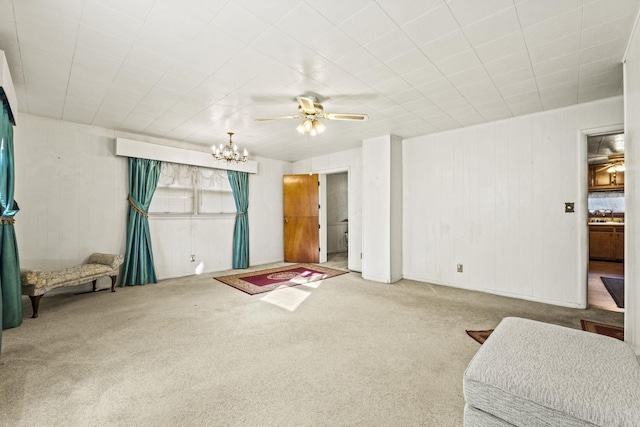 6885 N 315 E, Howe, IN 46746 - carpeted living area with ceiling fan with notable chandelier