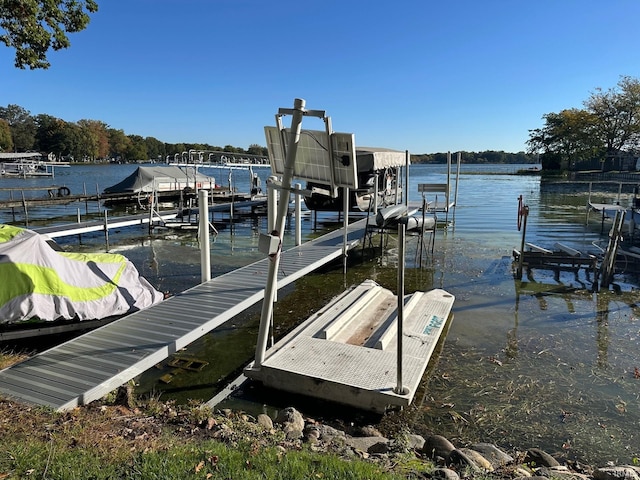 dock area featuring a water view