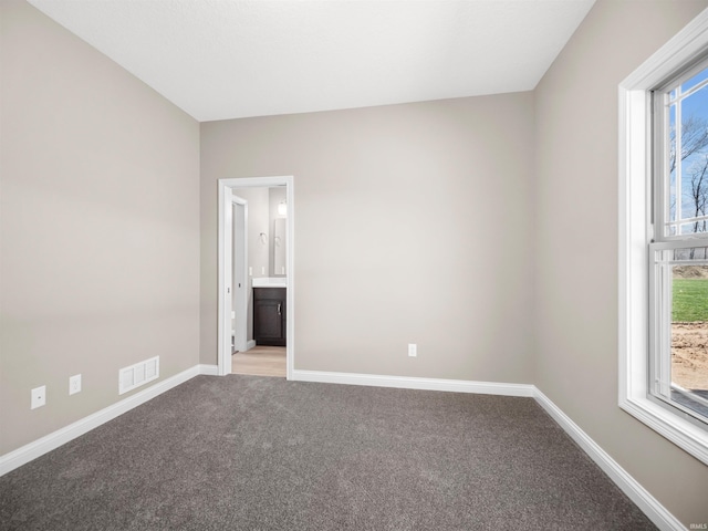 view of carpeted spare room