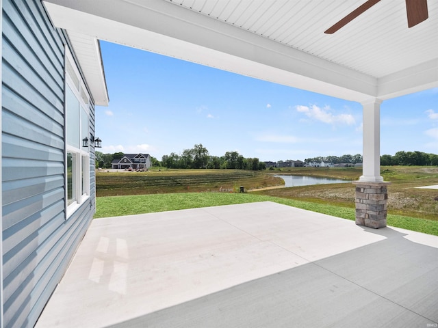 view of patio / terrace with a water view