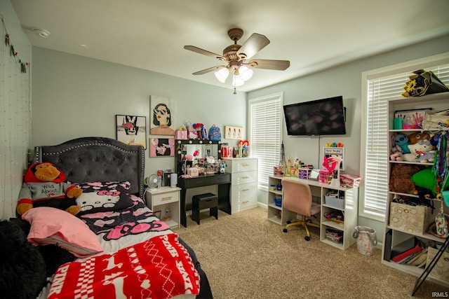 bedroom with ceiling fan and carpet floors