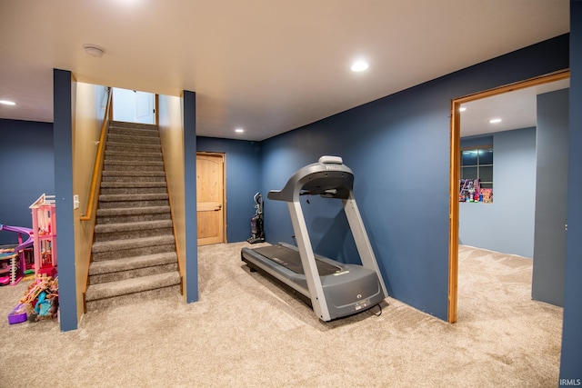 exercise area featuring carpet