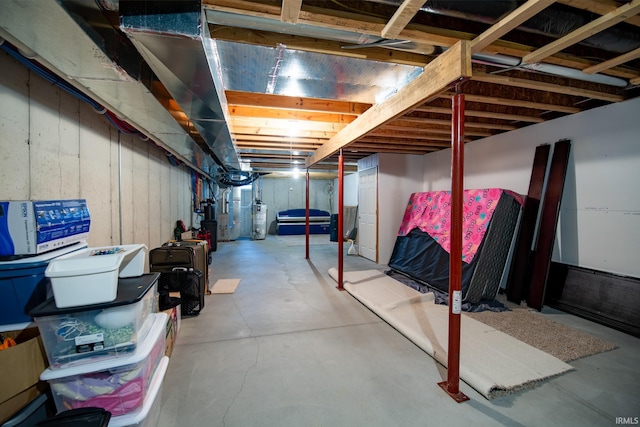 basement featuring water heater