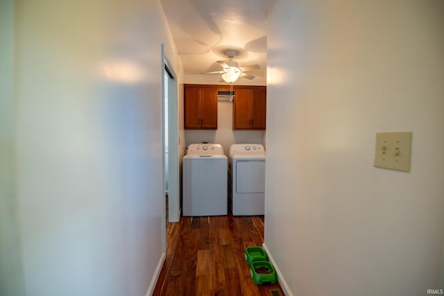 clothes washing area with ceiling fan, cabinets, independent washer and dryer, and dark hardwood / wood-style flooring