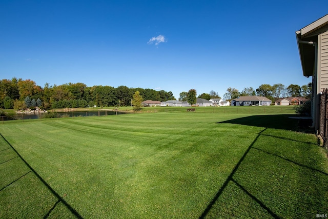 view of yard with a water view