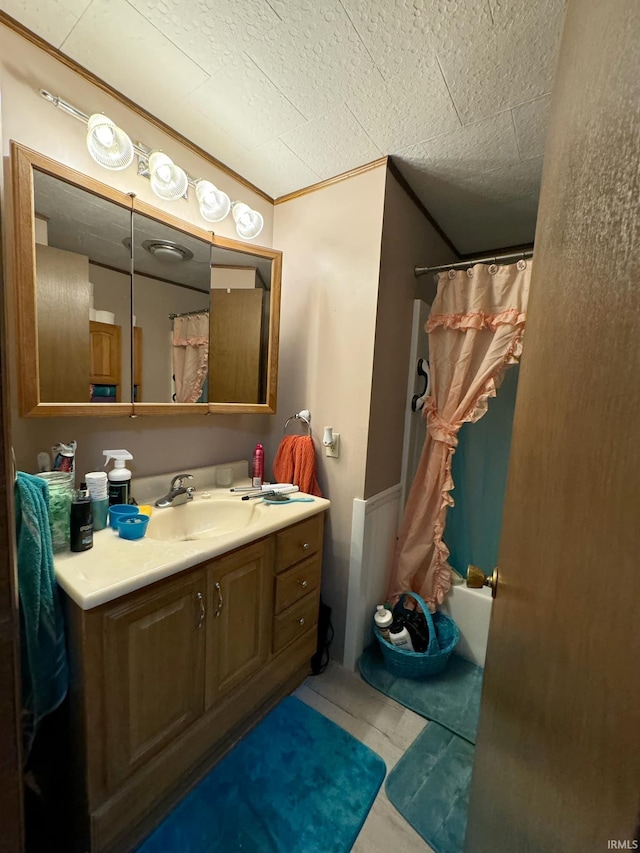 bathroom featuring vanity, ornamental molding, and shower / bathtub combination with curtain