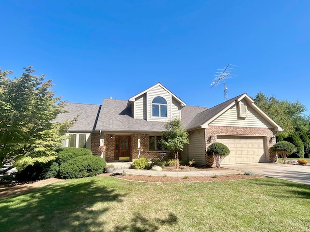 view of front of house with a front lawn and a garage