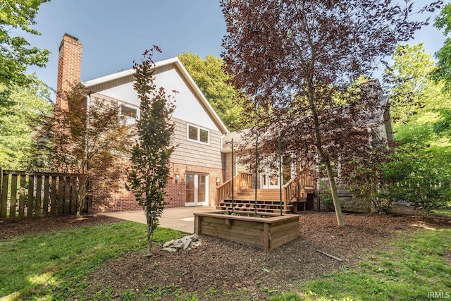 back of house with a patio area