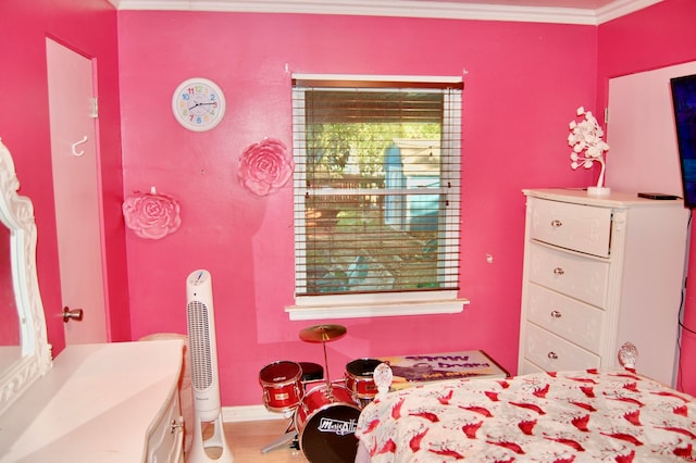 bedroom featuring crown molding