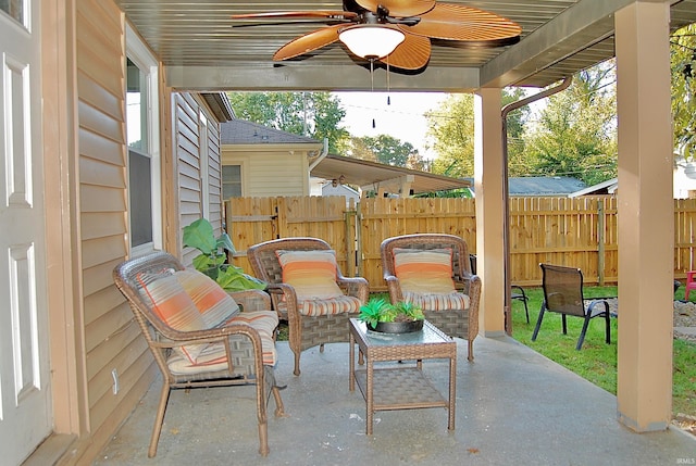 view of patio featuring ceiling fan