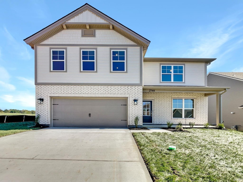 view of front of property featuring a garage