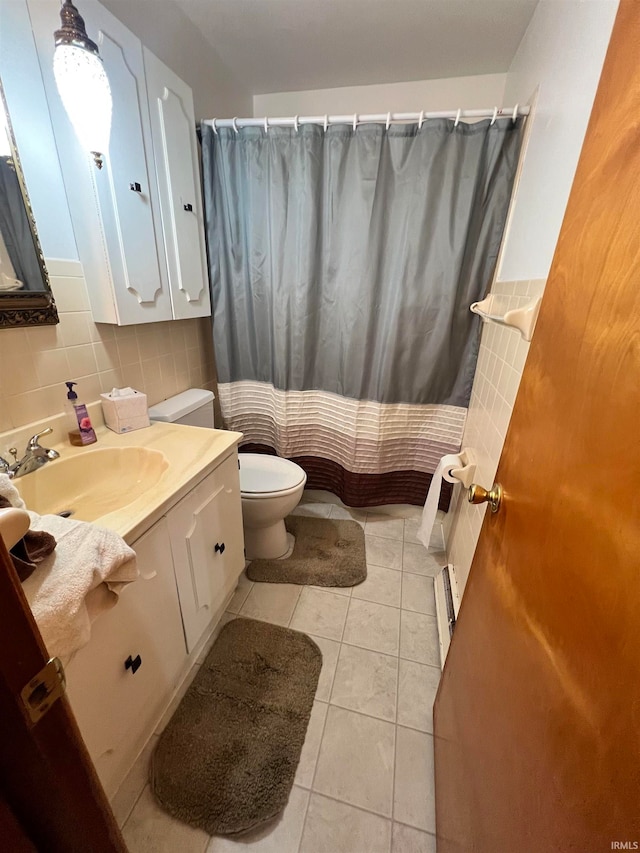 bathroom with toilet, curtained shower, tile patterned floors, decorative backsplash, and vanity