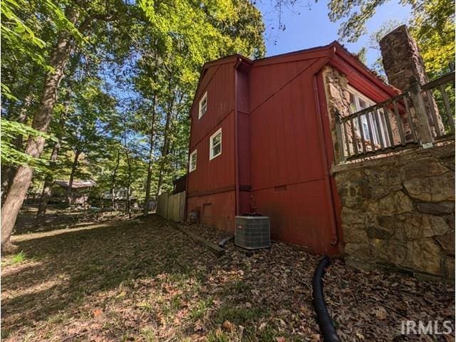 view of property exterior featuring central AC