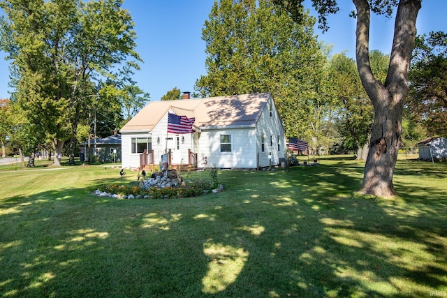 exterior space featuring a front yard