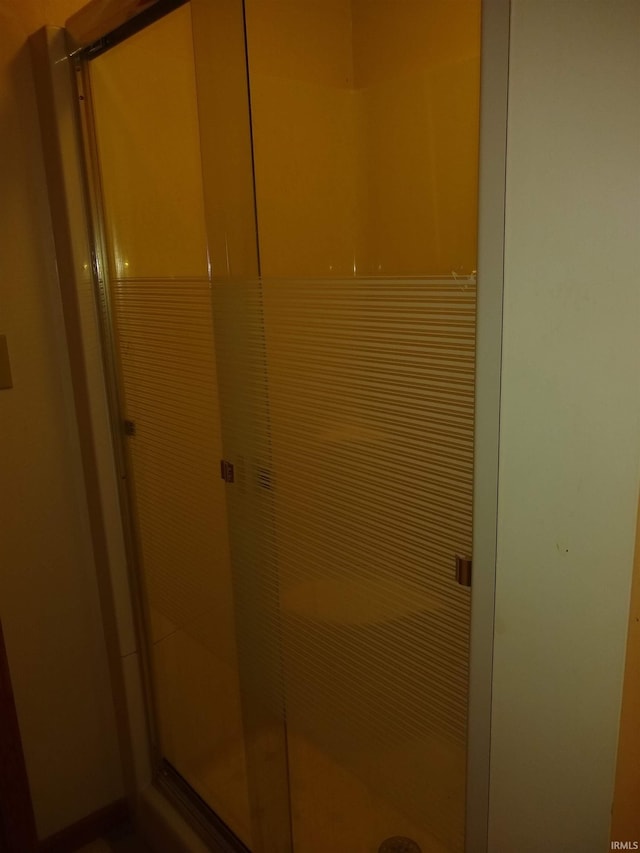 bathroom with an enclosed shower