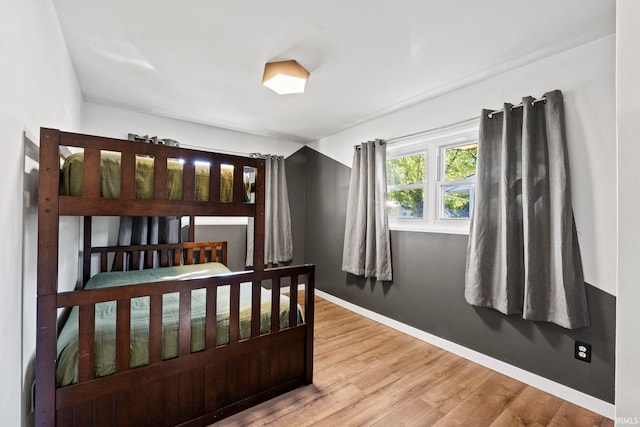 bedroom featuring hardwood / wood-style floors