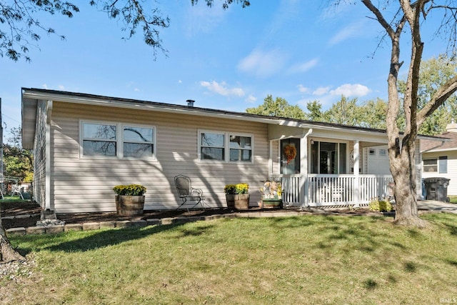 single story home with a front yard and a porch